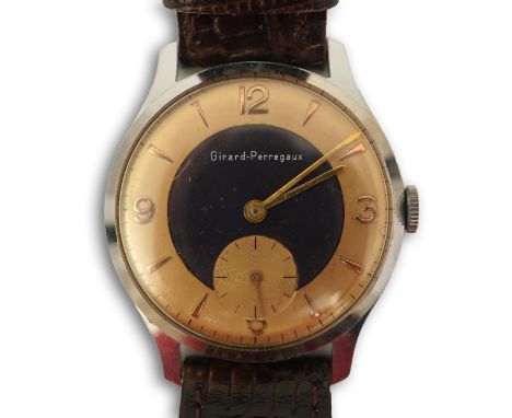 A gentleman's stylish 1960's stainless steel Girard Perregaux yellow and blue dial manual wind wrist watch, with baton and qu