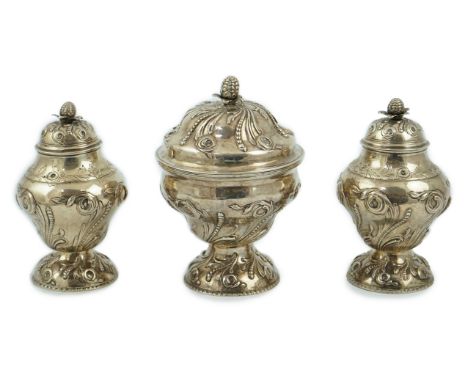 A pair of early George III silver tea caddies and a sugar bowl, by Samuel Taylor, of inverted pyriform shape and embossed wit