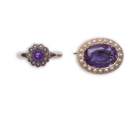 An amethyst brooch and an amethyst mourning ring, early 20th century, comprising: an oval brooch set with an oval amethyst wi
