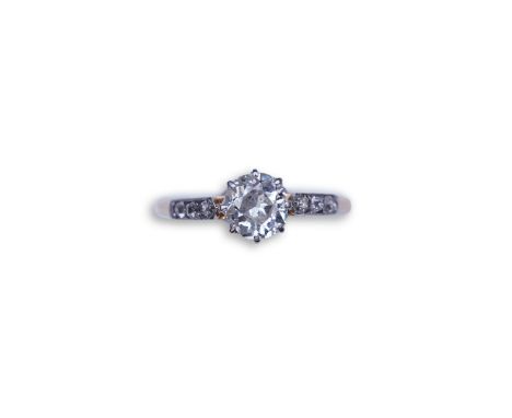 A diamond ring, early 20th century, claw-set with an antique cushion-shaped diamond weighing approximately 0.70 carats, to sh