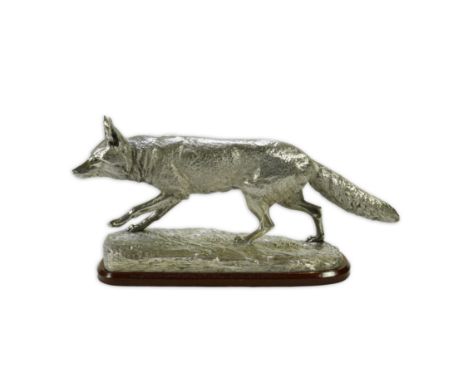 An impressive Victorian silver sculpture of a fox en passant, by R &amp; S Garrard &amp; Co (Robert Garrard II), with texture