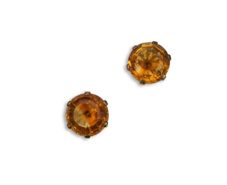 A pair of citrine ear studs, each set with a circular step-cut citrine, 1.3cm diameter each, post fittings  PLEASE NOTE:- Pro