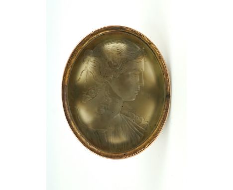A Georgian chalcedony intaglio fob seal, circa 1800 the oval matrix of pale chalcedony, finely carved to depict a classical l