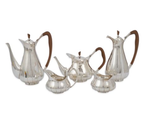 A stylish 1960's Asprey &amp; Co silver five piece tea and coffee service, of pyrifom, comprising a coffee pot, hot water pot