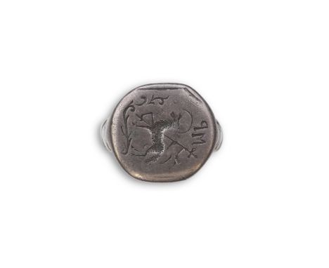 A signet ring, 17th century, engraved with the crest of the Agnus Dei (Lamb of God) with halo and cross staff with banner, pa