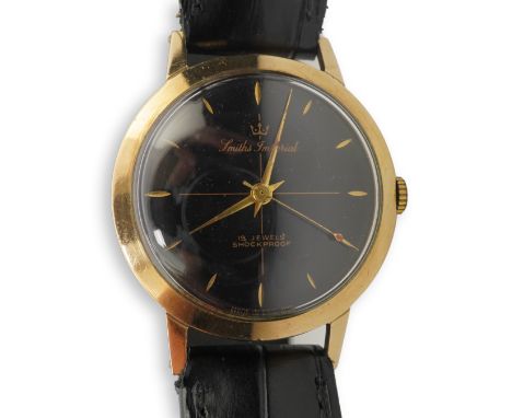 A gentleman's 1950's 9ct gold Smiths Imperial manual wind wrist watch, on a later associated Condor leather strap, with black