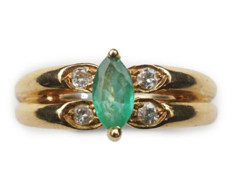 An emerald and diamond ring, set with a marquise-shaped emerald, to a double band set with brilliant-cut diamonds, mounted in