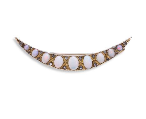 An opal and diamond brooch, early 20th century, designed as a crescent moon, set with opal cabochons and rose-cut diamonds, m