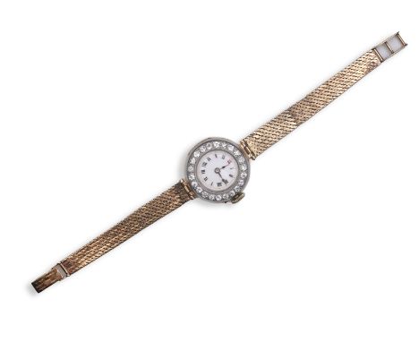 A lady's 9ct gold and diamond cocktail watch, early 20th century and later, the circular white enamel dial with Roman numeral