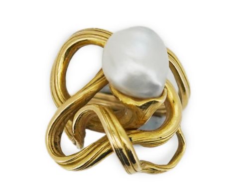 A pearl ring, in the Art Nouveau style, designed as a sinuous tendril, set with a pearl measuring approximately 10mm diameter