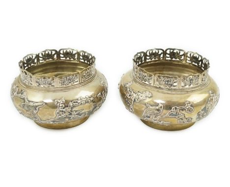 A pair of late 19th/early 20th century Chinese Export silver baluster bowls, by Zee Wo, Shanghai, with pierced borders and de