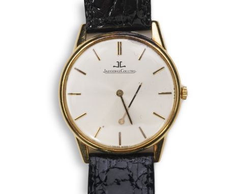 A gentleman's 18ct gold Jaeger LeCoultre manual wind dress wrist watch, on a later associated leather strap, with baton numer
