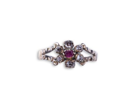 A Georgian ruby and diamond ring, early 19th century, of cluster design, set with cushion-shaped rubies and diamonds, to spli