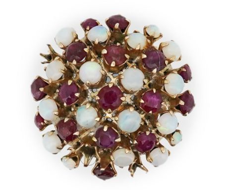 A ruby and opal cocktail ring, mid 20th century, designed as a bombé cluster of circular-cut rubies and cabochon opals, size 