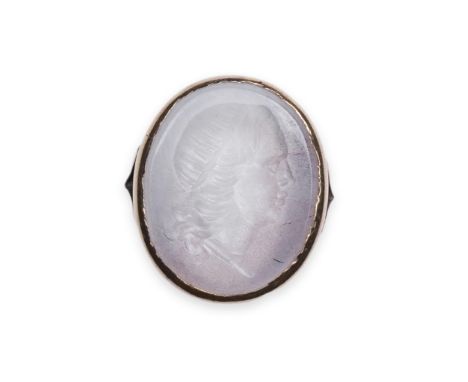A chalcedony intaglio ring, early 19th century, set with a pale chalcedony intaglio depicting a lady in profile, in a plain g