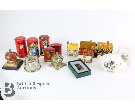 Fifteen novelty money boxes, to include three thatched houses, two tin post boxes with Charles and Diana, one tin postbox wit