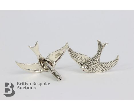 Gentleman's silver cufflink's, in the form of swifts, with ruby eyes.&nbsp;