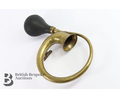 Antique brass classic car horn, with rubber press, approx 40 cms in length.&nbsp;