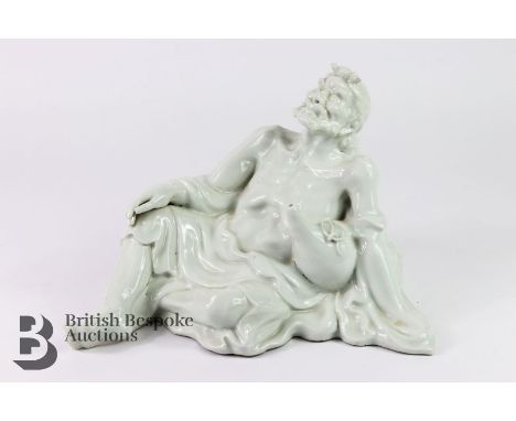20th century ceramic figure, resting with a gourd, approx 30 x 23 cms.&nbsp;
