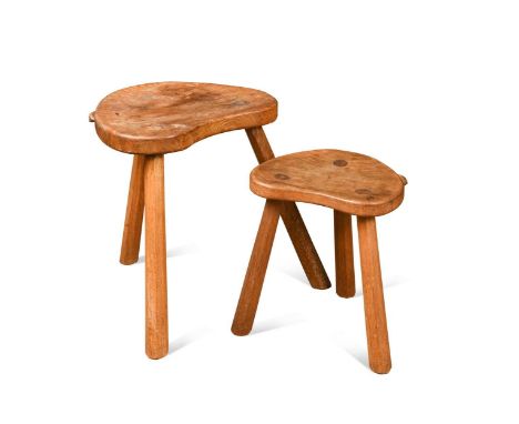 Robert 'Mouseman' Thompson, two kidney-shaped oak tripod stools, each with carved mouse signaturethe larger 45cm high, the sm