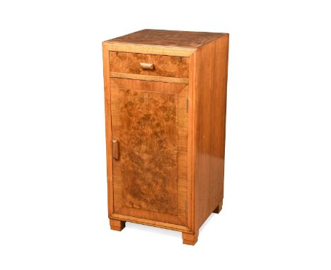 A Heals Art Deco walnut side cabinet, with single drawer over a cupboard below, ivorine disc to drawer top76 x 37 x 39cmUneve