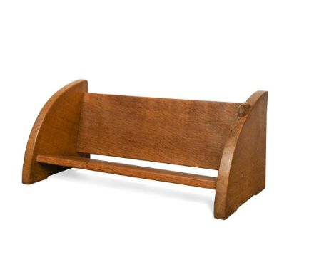 Robert 'Mouseman' Thompson, an oak book trough, the curved side support with carved mouse signature20 x 46 x 20cm