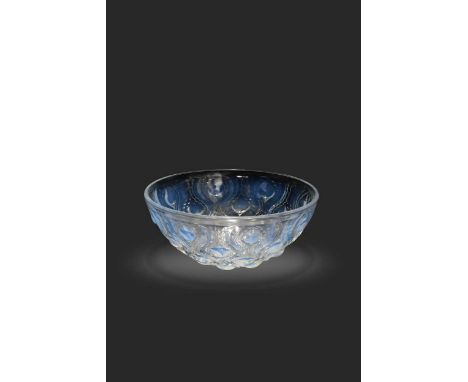 Bulbes, an R Lalique opalescent glass bowl, moulded in high relief with a design of bulbs radiating around a central flower, 