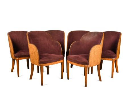 In the manner of Harry & Lou Epstein, a set of six Art Deco walnut cloud-back dining chairs, including two carvers, each rais