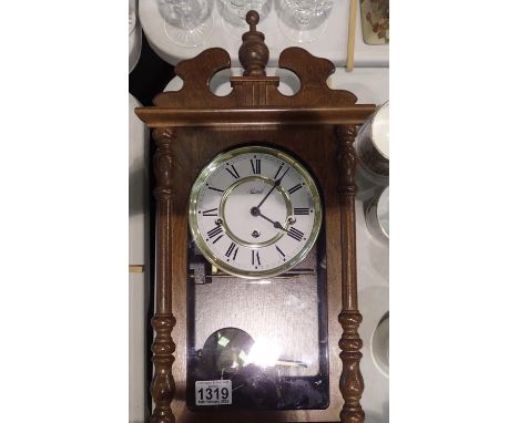 Hermle mahogany cased mechanical  wall clock, Westminster chime, 54 x 26 x 14 cm. Not available for in-house P&amp;P, contact