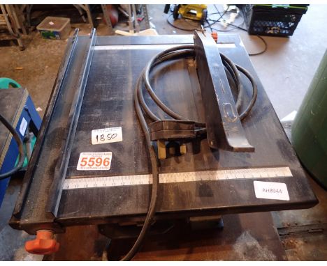 Performance tile cutting saw. Not available for in-house P&P, contact Paul O'Hea at Mailboxes on 01925 659133Condition Report