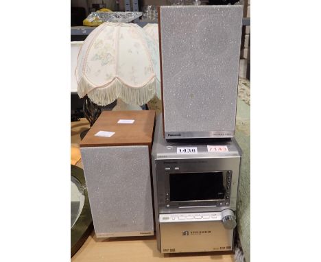 Panasonic DVD stereo system SA-PM91D 5 DVD changer with two Panasonic three way speakers model SB-PM91. Not available for in-