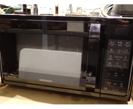 Samsung Smart Oven, 900W microwave. Not available for in-house P&P, contact Paul O'Hea at Mailboxes on 01925 659133Condition 