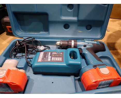 Makita cordless drill with two batteries and charger. Not available for in-house P&P, contact Paul O'Hea at Mailboxes on 0192