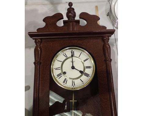Hermle oak cased wall chiming clock, H: 73 cm. Not available for in-house P&P, contact Paul O'Hea at Mailboxes on 01925 65913