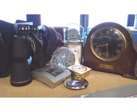 Shelf of mantle clocks, binoculars and paper weight. Not available for in-house P&amp;P, contact Paul O'Hea at Mailboxes on 0