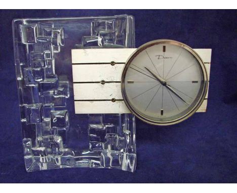 Daum France, a moulded crystal glass mantel clock, circa 1965, Thor model, heavy glass base with moulded random stack block p