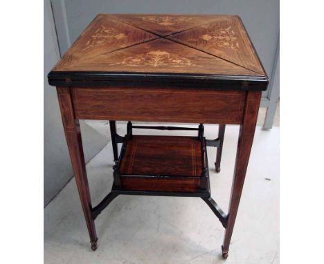 A late 19th century Victorian inlaid rosewood Envelope Folding Card Table, the top inlaid with scrolling foliate designs, ope