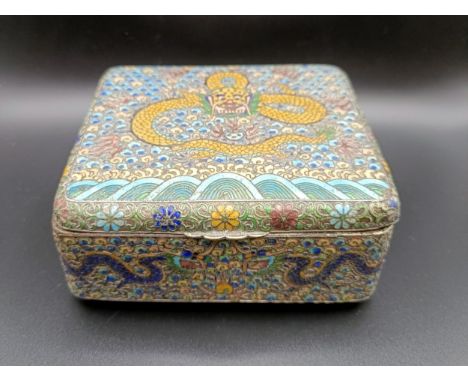 A Chinese cigarette box, decorated a dragon in enamel colours, 9.5 cm wideslight loss. makers mark