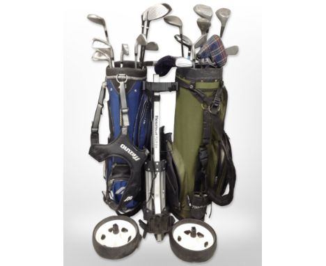 A golf trolley by Howson, together with two golf bags containing assorted irons and drivers including Dunlop, Adams, Fazer, D