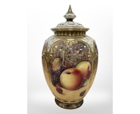 A Royal Worcester urn with cover, hand painted with fruit, black mark to base, numbered 169, signed P Platt, height 19 cm. CO