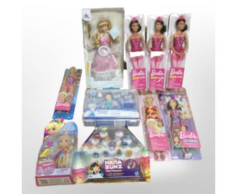 11 Disney, Mattel and other toys including Barbie.