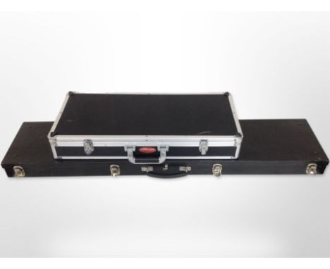 A Stagg instrument case, width 71 cm and another larger (2)