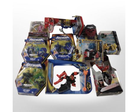 10 Hasbro, Bandai and Mattel figurines including Batman, Power Rangers, Transformers, boxed.