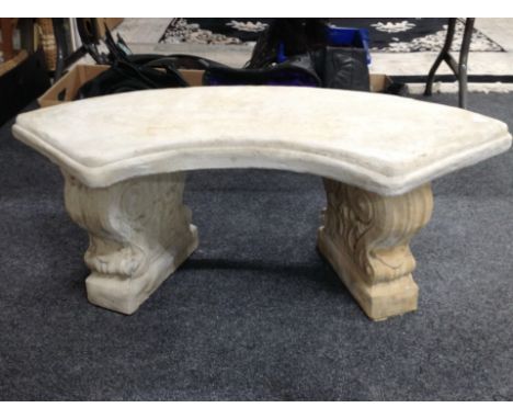 A concrete curved garden bench on classical style pedestals, width 102 cm 