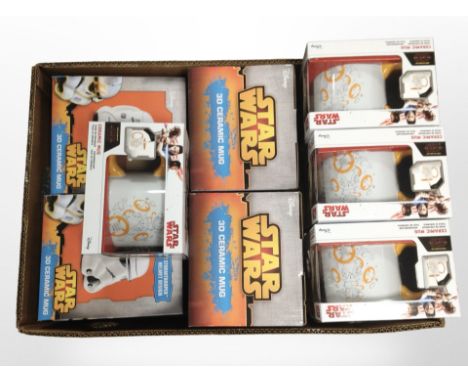 Four Disney Star Wars 3D ceramic mugs and seven further Funko Star Wars ceramic mugs, all boxed.