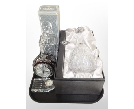 Two boxed Edinburgh Crystal decanter, a Staigen ruby-glass quartz mantel timepiece, and a Stewart crystal timepiece.