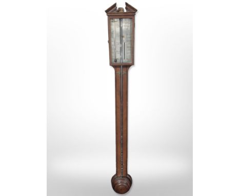 A 19th-century mahogany mercury stick barometer by Ortelly & Co., Macclesfield, length 97cm.