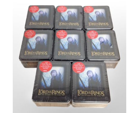A group of eight Artbox The Lord of the Rings: The Return of the King Action Flipz tins, all sealed in cellophane.