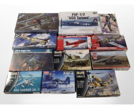 12 Revell, Airfix, Academy and Italeri scale modelling sets to include military aircraft and tanks, all boxed.