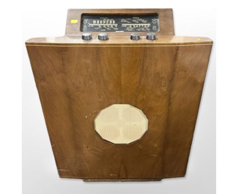 A mid-20th century Murphy walnut-cased radio, width 61cm.